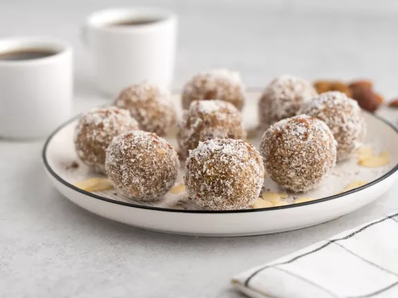 Coconut candies with nuts and dates