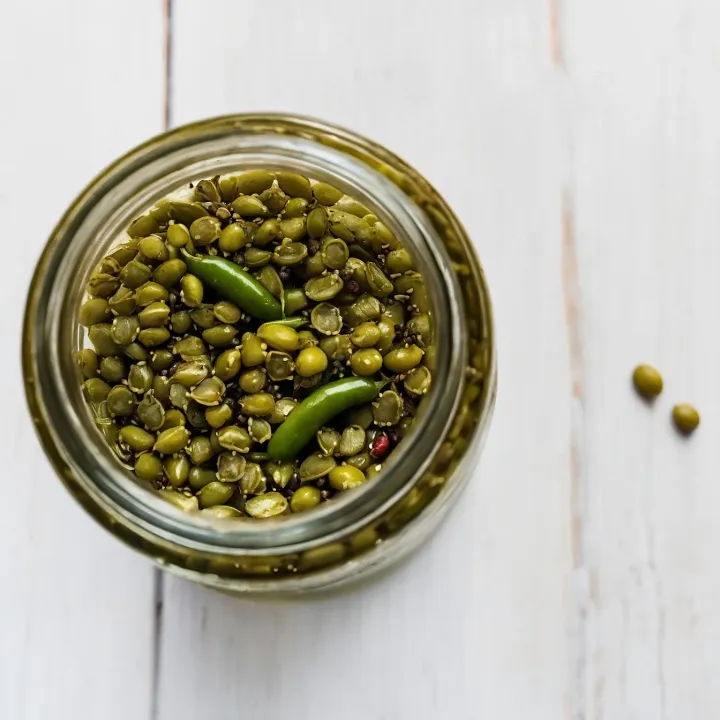 Close the cooled jars of pickled beans with plastic lids (do not seal). After that, put the beans in the refrigerator for a day for complete pickling. After this time, the pickled beans are ready to serve, delighting with their spicy taste.
