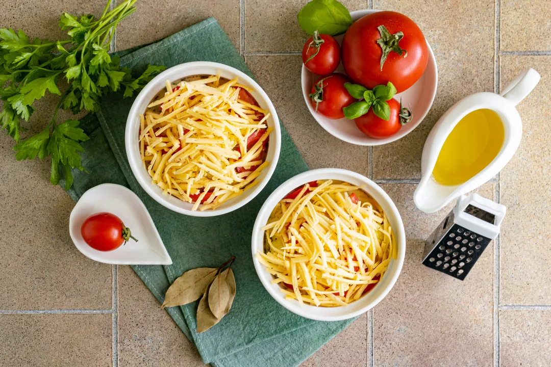 <p>Garnish the casserole with grated hard cheese.</p>