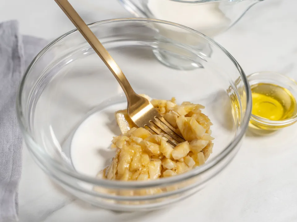 Grind the rice cakes in a blender until fine crumbs are formed. This will be the base of your dessert.