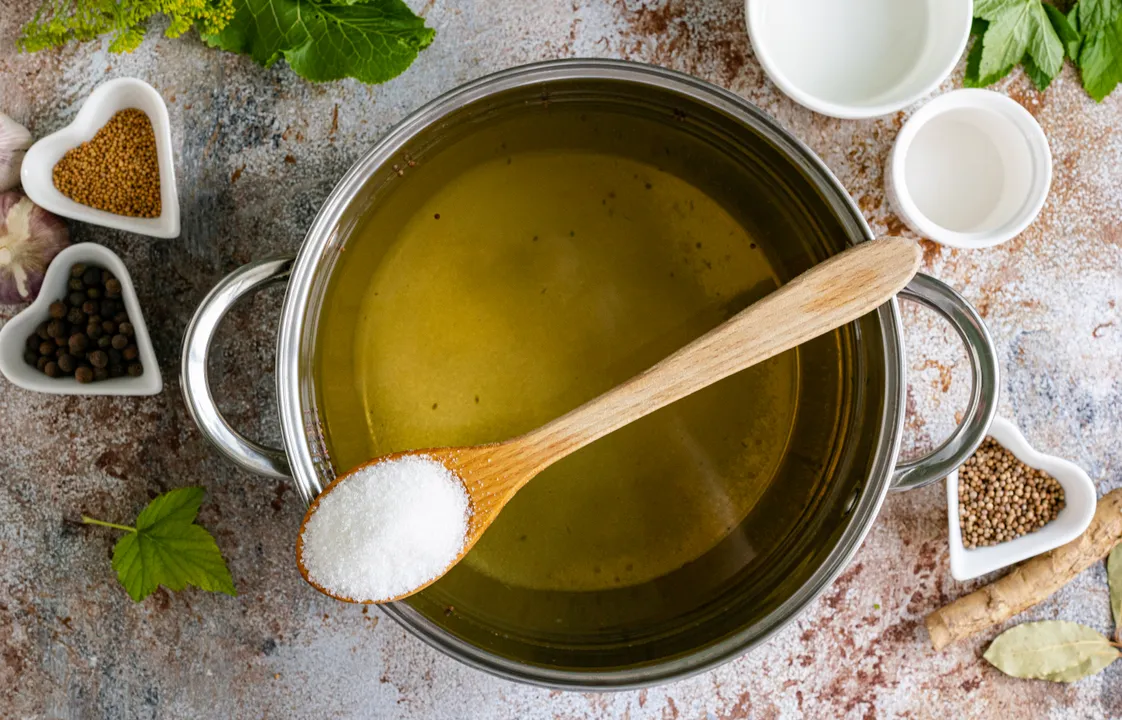Add sugar. Stirring until the salt and sugar are completely dissolved, bring the marinade to a boil.